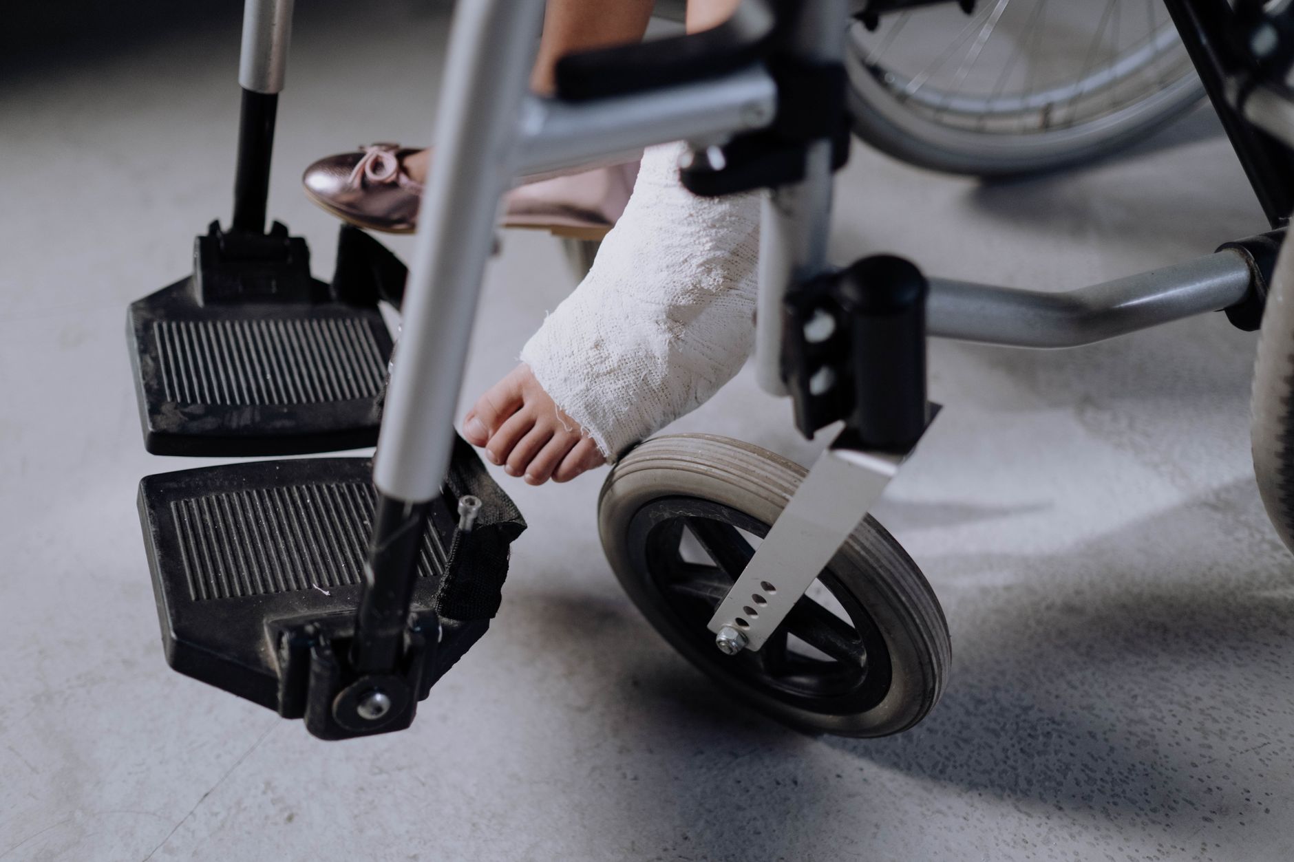 a person who uses a wheelchair looking forward with quiet resolve, catastrophic spinal injury
