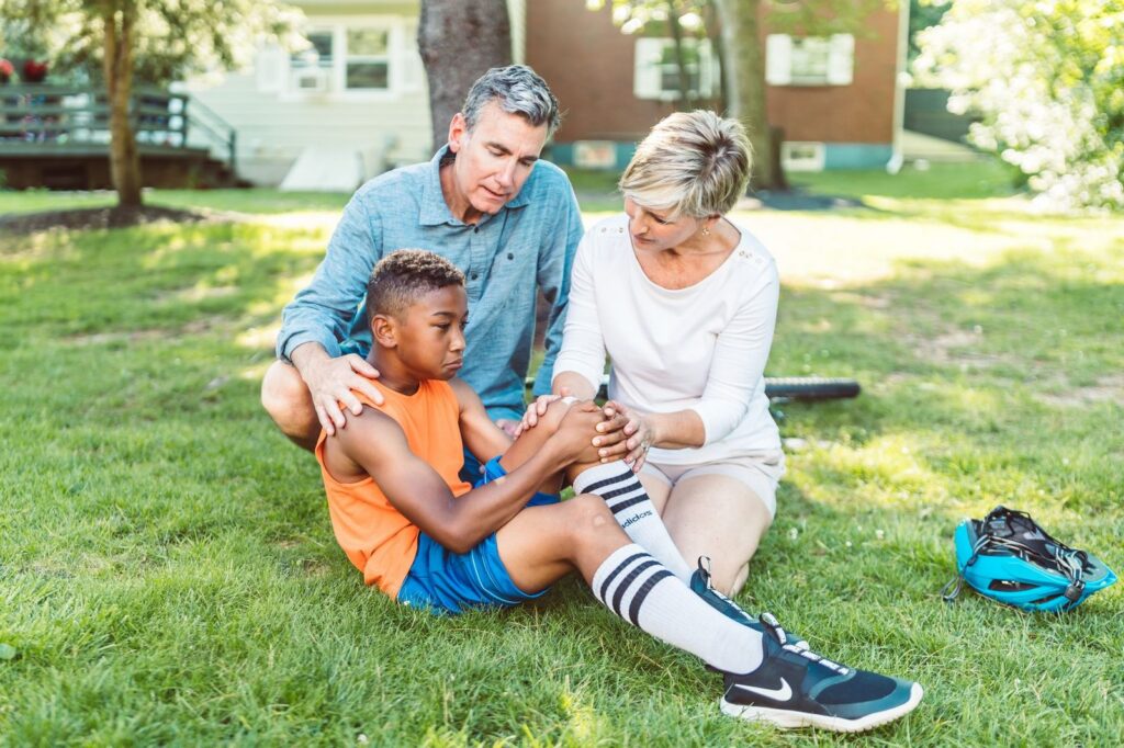 a burn survivor returning to an everyday family routine after burn injury recovery, featuring Hispanic and Latino people