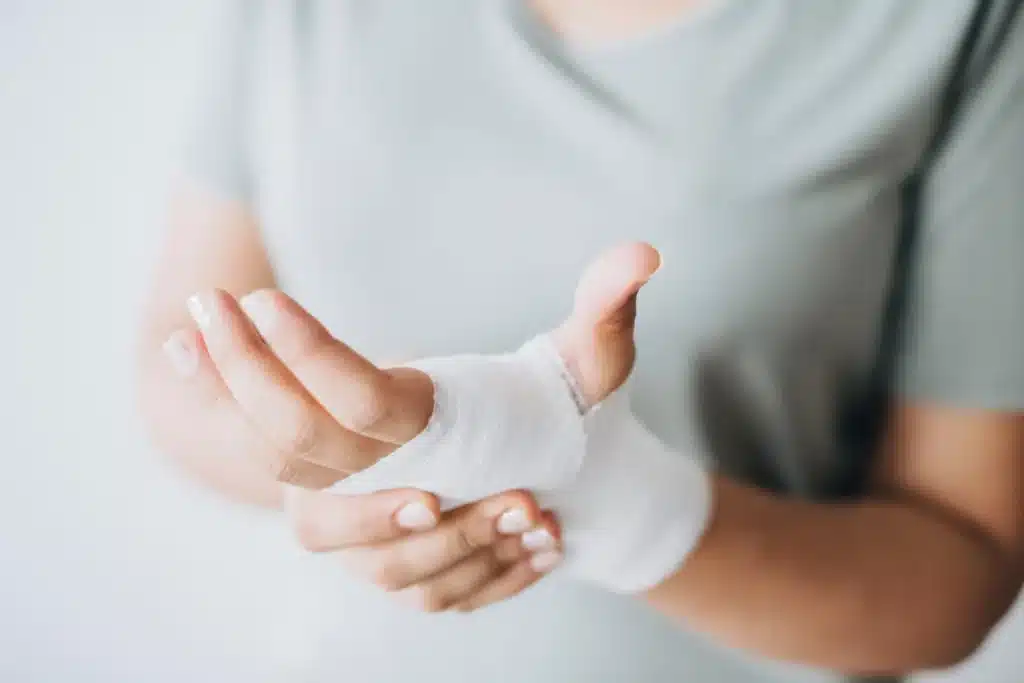 Person with bandaged hand