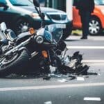 Motorcycle accident scene on city street