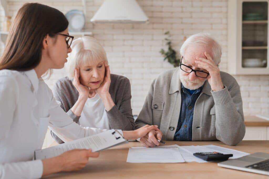 Catastrophic injury claims lawyer consulting with client about insurance denial - CHG Lawyers