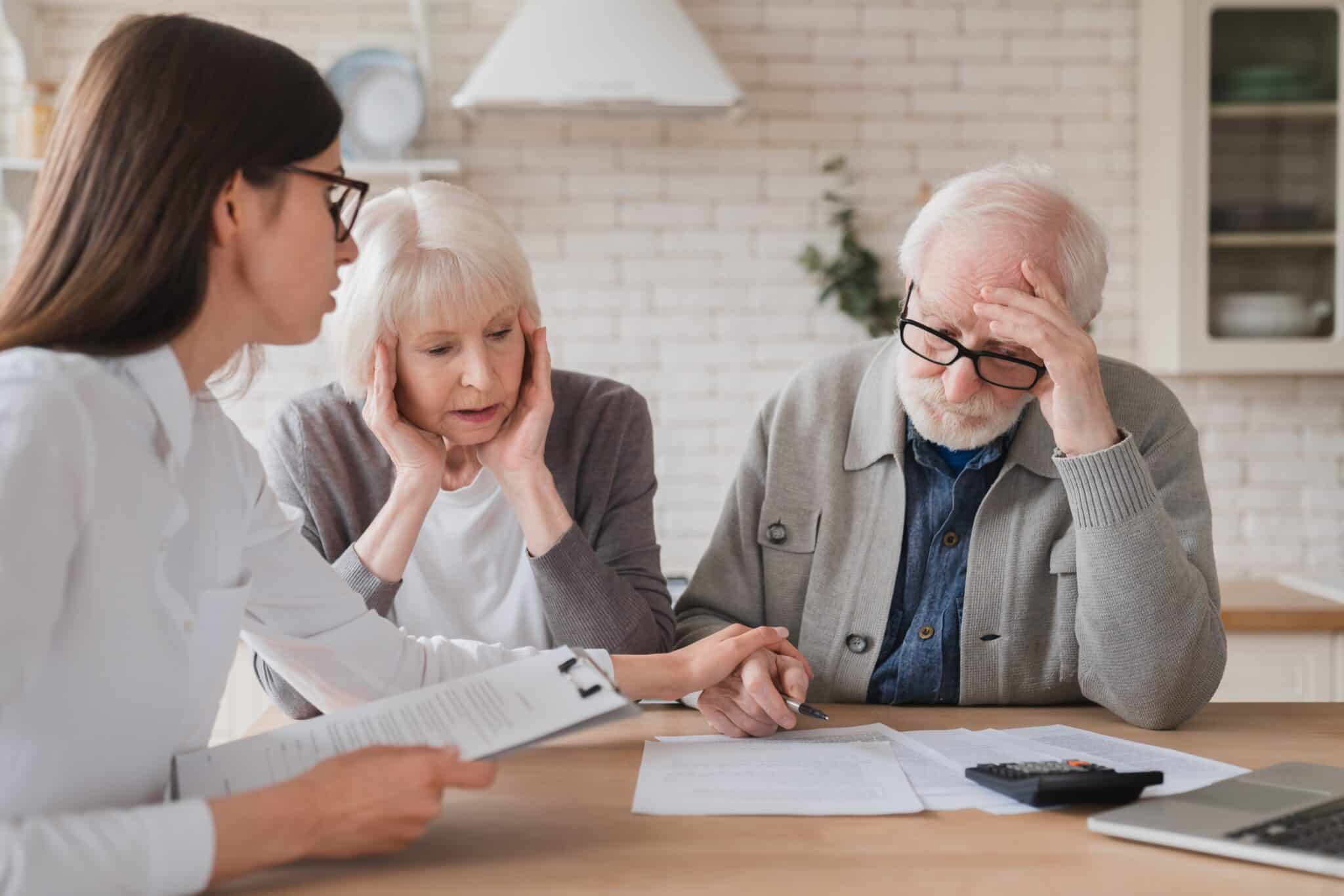 Catastrophic injury claims lawyer consulting with client about insurance denial - CHG Lawyers